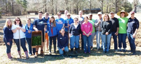 The OVB Garden Camp Seafarer volunteers celebrate after the planting is completed.
